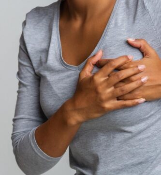 woman with pain in her left boob