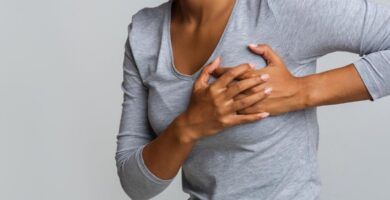 woman with pain in her left boob