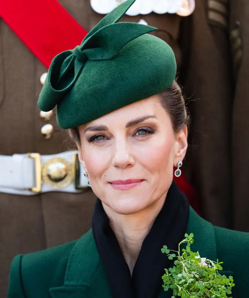     Catherine, Princess of Wales, close-up, wearing a dark green hat and coat