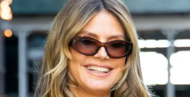 Heidi Klum exhibits off her curves in a plunging mini costume throughout a head-turning look in New York 16 Heidi Klum shows off her curves in a plunging mini dress during a head-turning appearance in New York