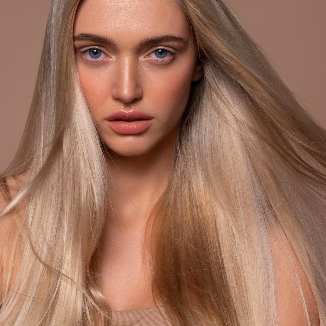 Smooth, straight hair with anti-frizz oils, creams and conditioners