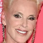 Rockies star, 62, hasn't aged a day with incredibly timeless looks as fans declare her 'forever'