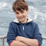Prince Louis' eighth birthday portrait was taken on a boat off the coast of Cornwall.