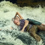 Charlize Theron and Taron Egerton face off