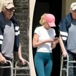 David Hasselhoff uses a walker during a rare outing with his wife Hayley Roberts