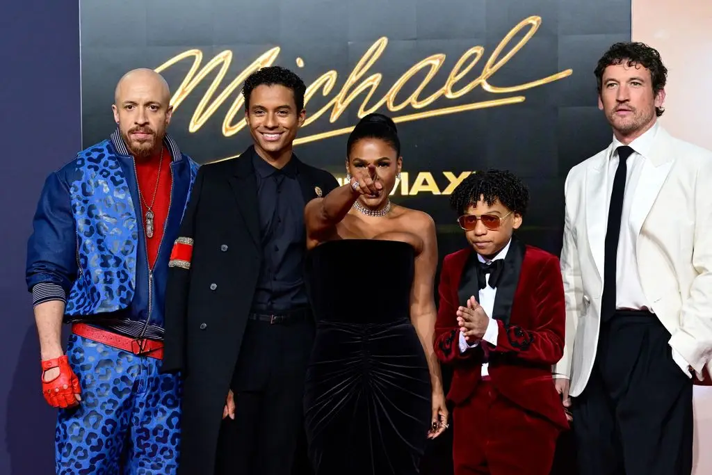 American actor KeiLyn Durrel Jones, American actor Jaafar Jackson, American actress Nia Long, American actor Juliano Valdi and American actor Miles Teller pose as they arrive on the red carpet for the world premiere of the Michael Jackson biopic 