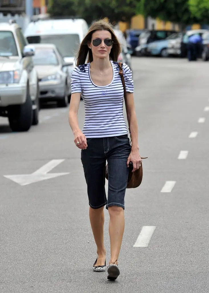 Princess Letizia of Spain arrives at Club Nautico in denim capris and striped t-shirt