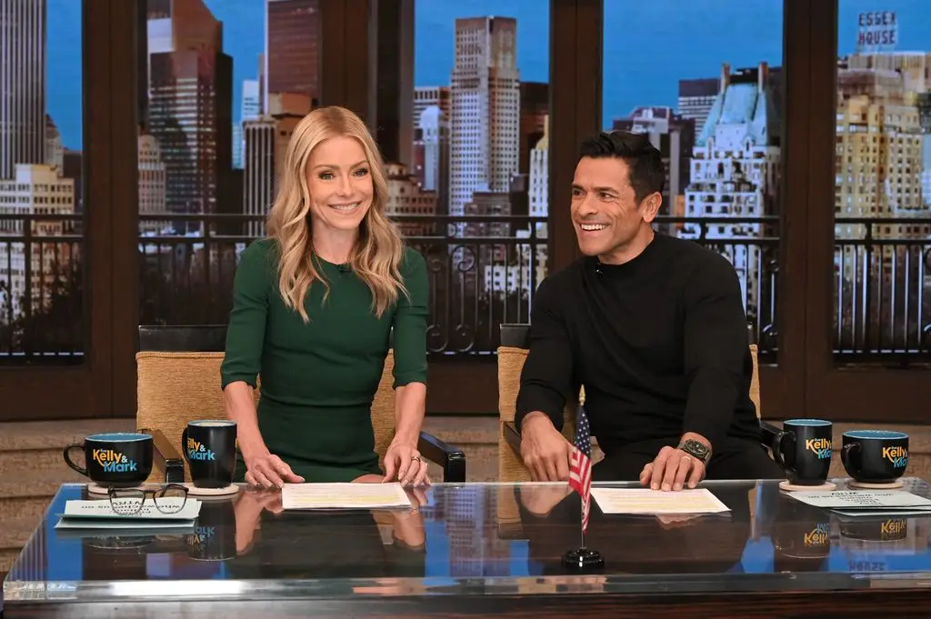 Kelly Ripa Exposes Ryan Seacrest's 'Fixed' Wardrobe Malfunctions Reside On Air 1 photo of Keely Ripa and Mark Consuelos live with Kelly and Mark laughing