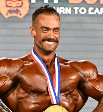 chris bumstead celebrates winning the classic physique news photo 1760085525.pjpeg