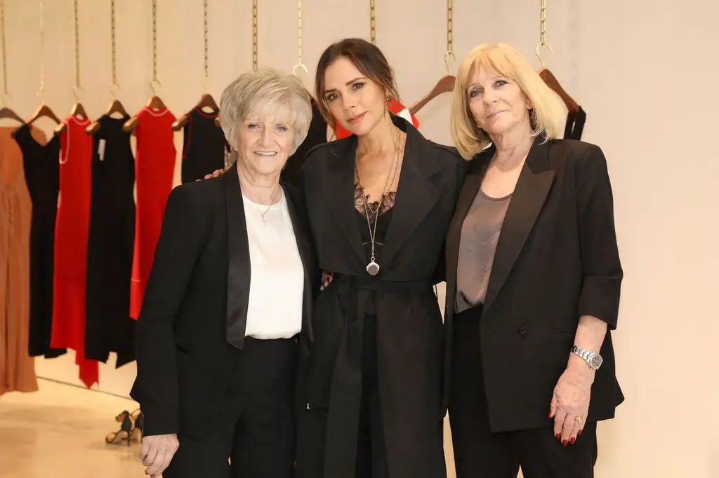 Victoria Beckham's mom ditches vogue label VB for glowing Part Eight costume 2 Victoria Beckham and her mother Jackie Adams attend the International Women's Day edition of Breakfast at Annabel's with businesswoman Victoria Beckham OBE
