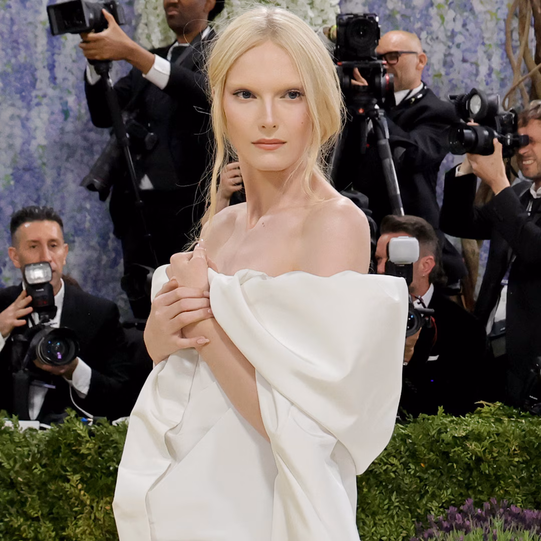 Model Alex Consani frees the nipple in a see-through look