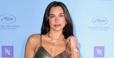 Dua Lipa is the ultimate showgirl in a shimmering plunging mini dress in Cannes