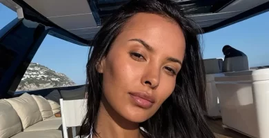 Maya Jama is all legs and poses as a sizzling summer pin-up in a tiny swimsuit and sky-high heels.