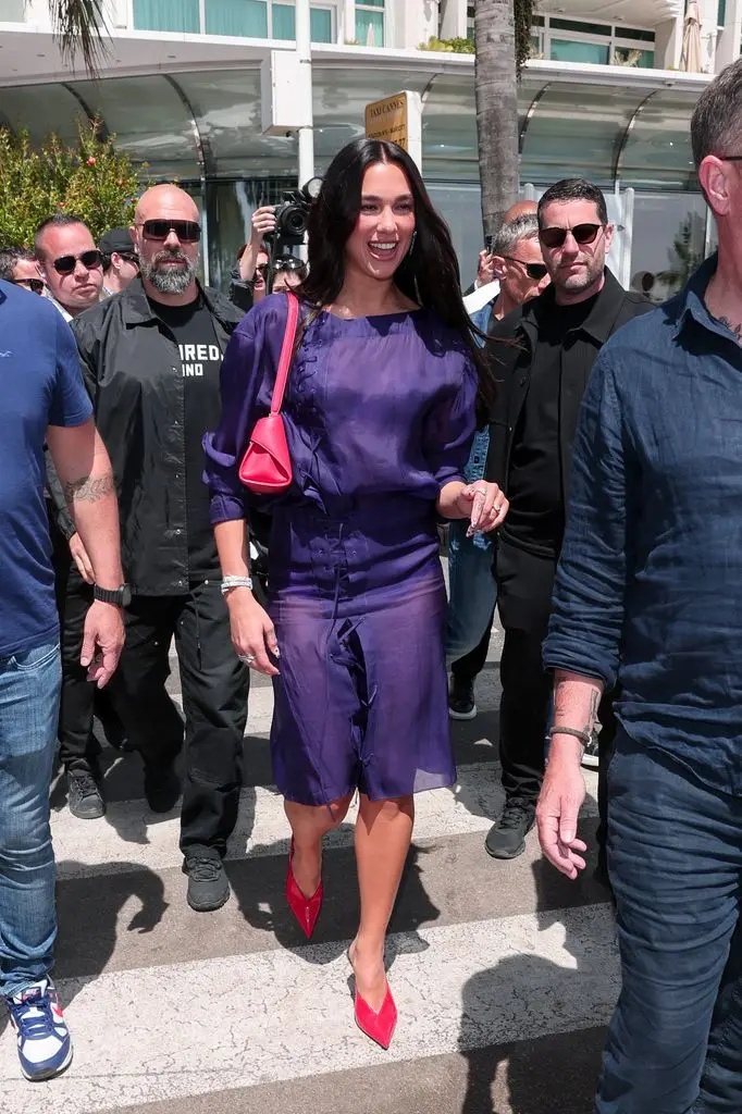 Dua Lipa in purple Ferragamo dress