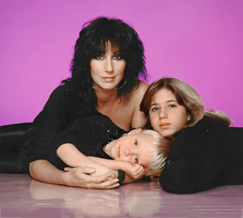 Singer and actress Cher with children Chastity Bono and Elijah Blue Allman poses for a portrait in 1980