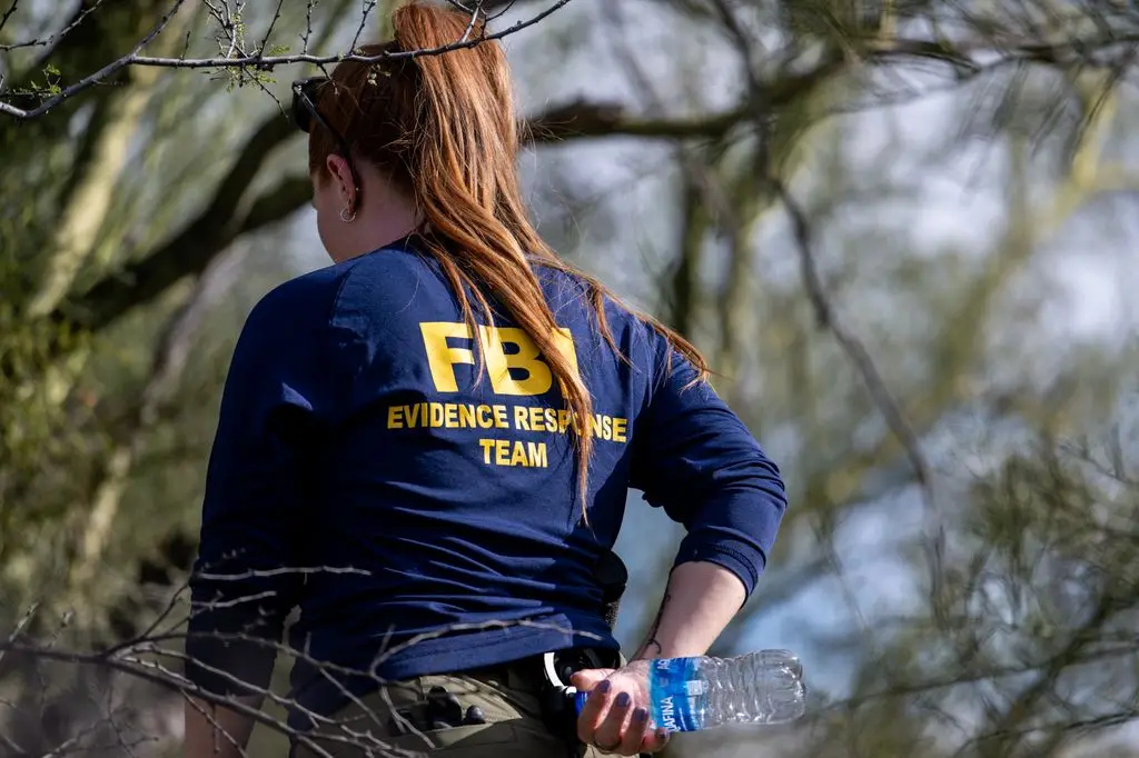 Police rush to Nancy Guthrie's residence after streamer finds 'human bones' close by 1 An FBI member monitors the area around Nancy Guthrie's residence