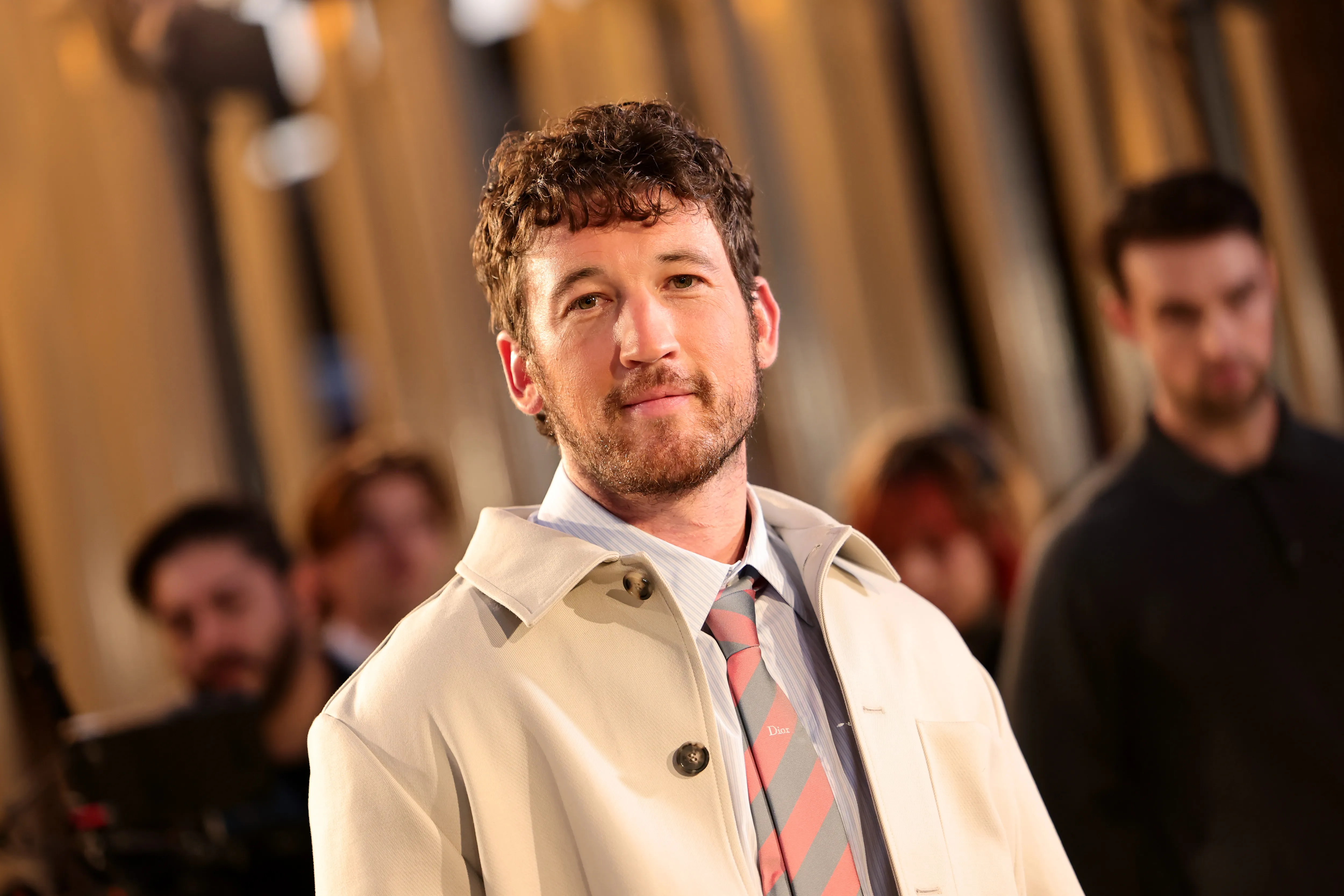 Miles Teller attends the Dior Cruise 2027 show at the Los Angeles County Museum of Art