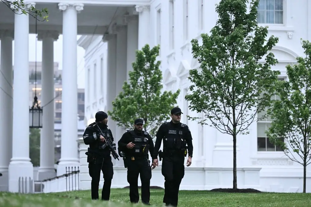 White Home capturing suspect recognized 1 Secret Service Agents Seen After Lockdown Lifted at White House