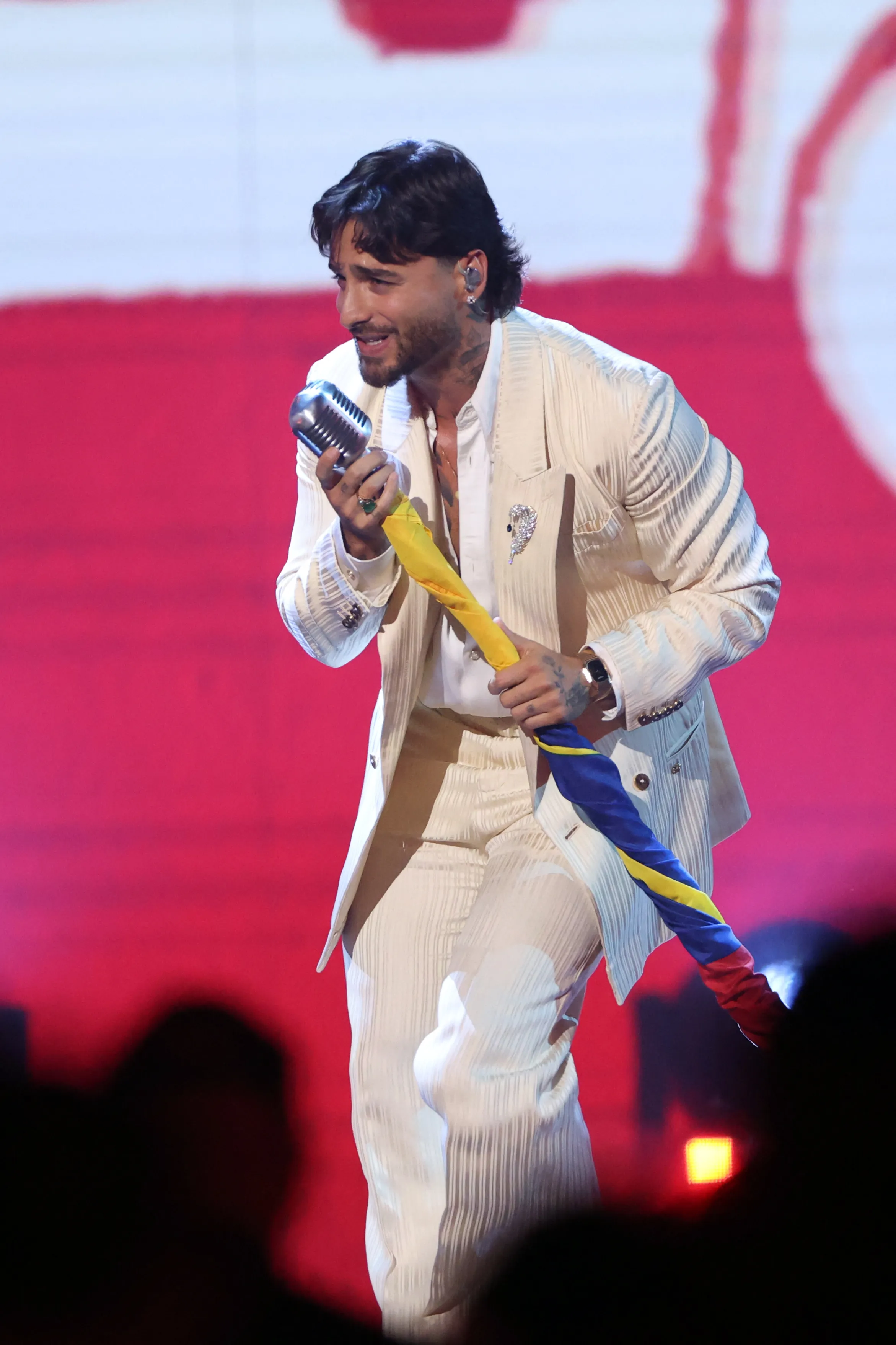 Maluma performs on stage at the American Music Awards