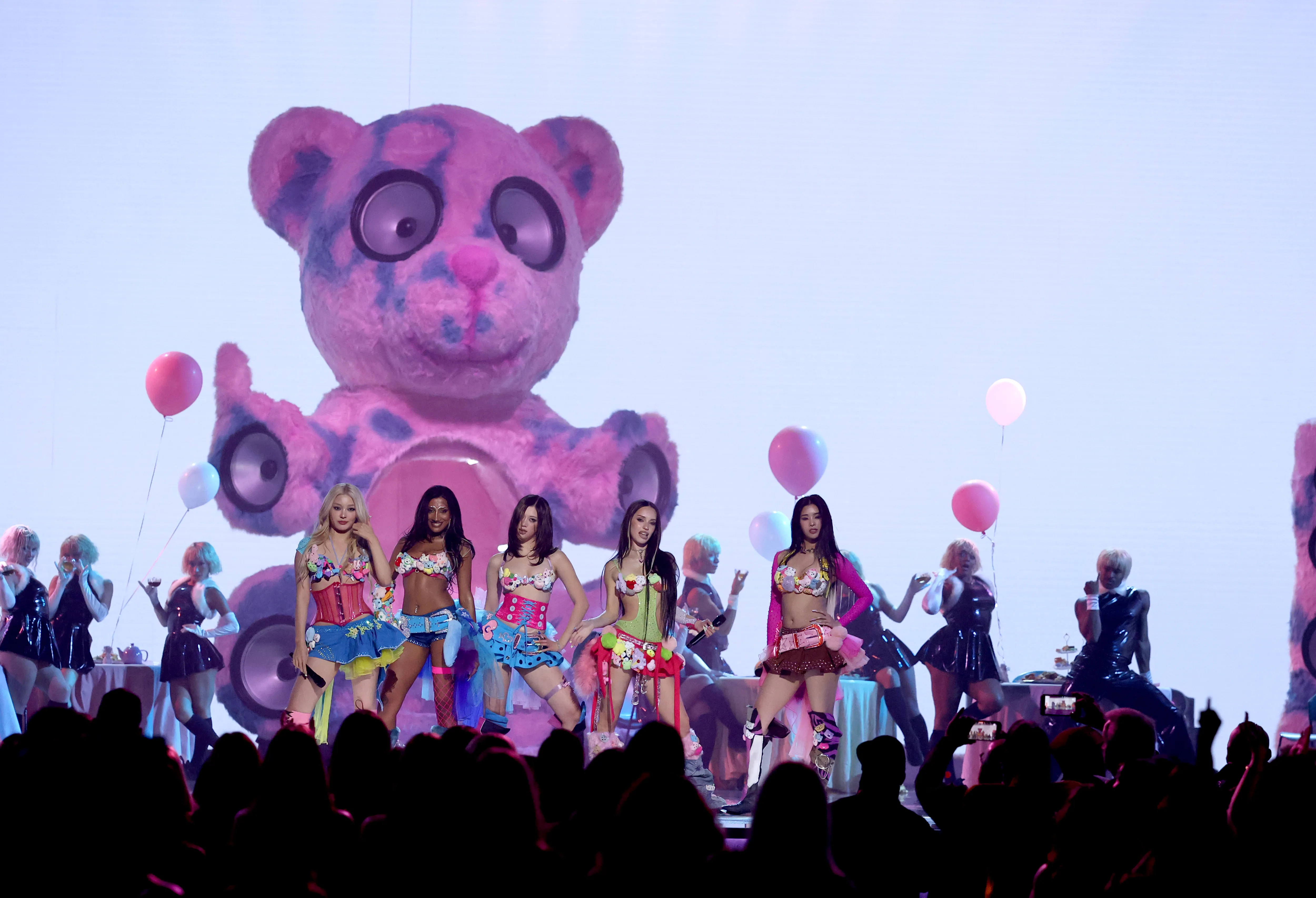 KATSEYE performed on stage at the American Music Awards.