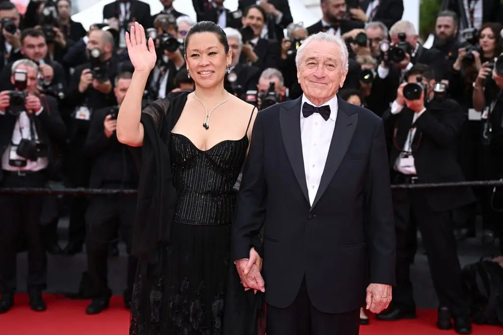 Robert De Niro, 82, enjoys uncommon hand-in-hand outing with companion Tiffany Chen, 46 1 Tiffany and Robert at the Cannes Film Festival, 2025