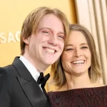 Jodie Foster's son Charlie towers over her for a rare star appearance