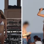 Alessandra Ambrosio strips down to a tiny bikini during a busy day at the beach