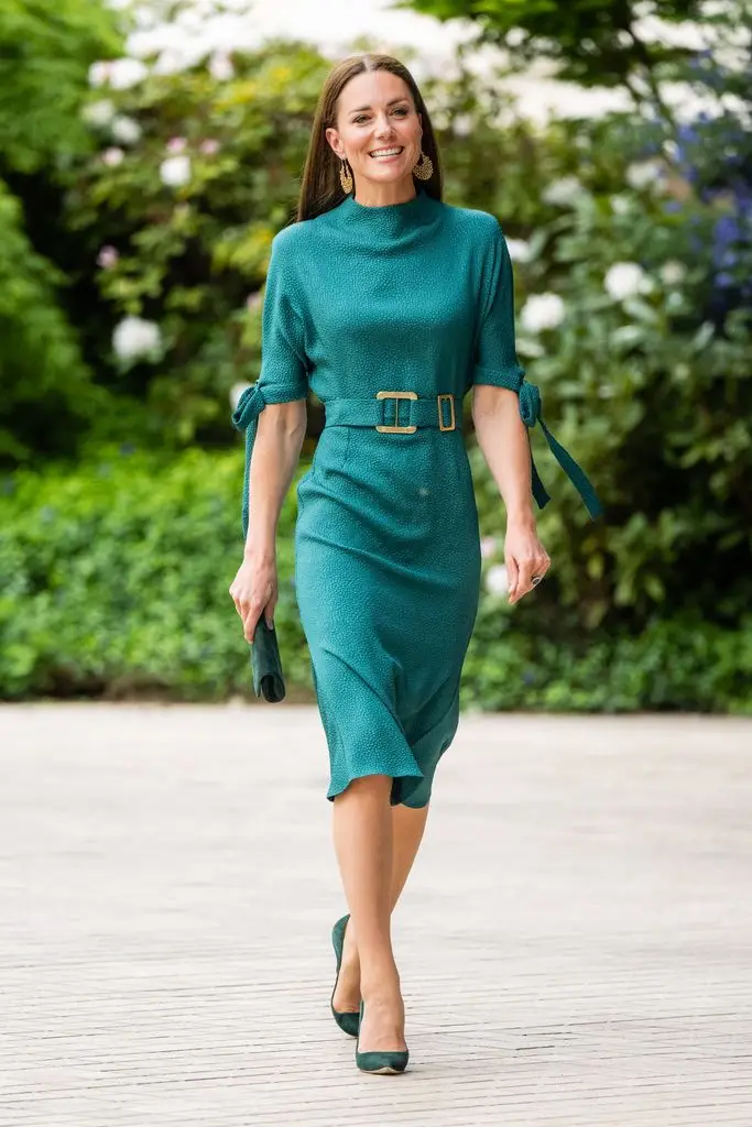 Kate Middleton wears a green Edeline Lee dress and green Emmy London high heels