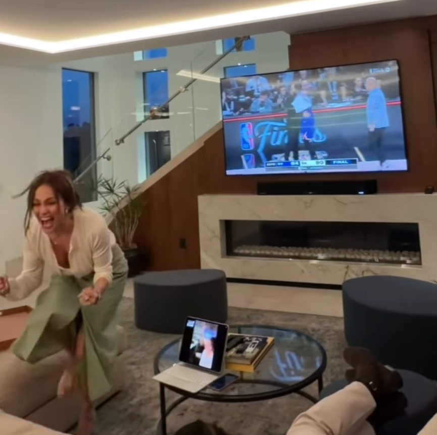 Jennifer Lopez reacting to the Knicks winning the NBA Finals on June 13, 2026, beating the San Antonio Spurs