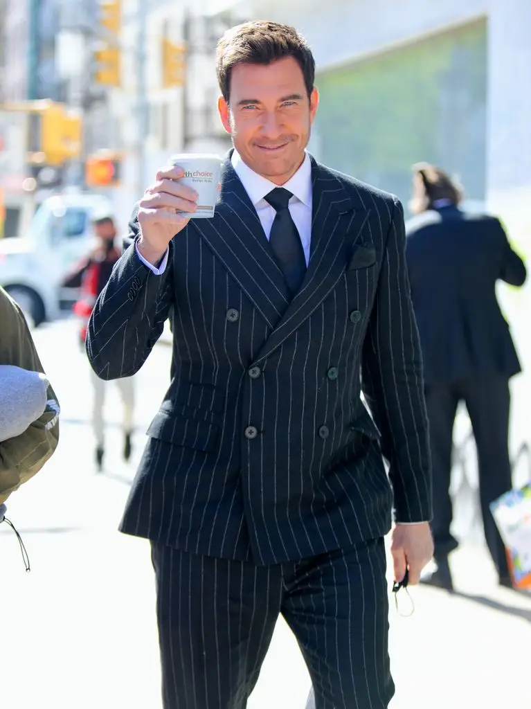 Dylan McDermott in a striped double-breasted suit on the set of 'Law and Order: Organized Crime' in 2021.