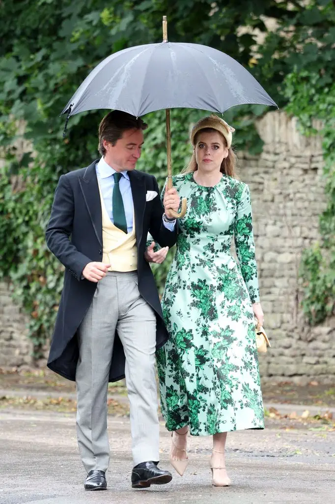 Peter Phillips and Harriet Sperling share their first romantic kiss after a fairytale marriage ceremony 10 Edoardo Mapelli Mozzi and Princess Beatrice of York walking and holding an umbrella