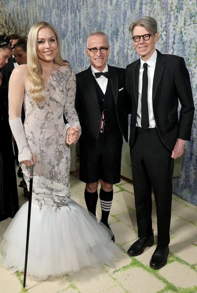 Lindsey Vonn, Thom Browne and Andrew Bolton attend the 2026 Met Gala celebration "Costume art" at the Metropolitan Museum of Art on May 4, 2026 in New York