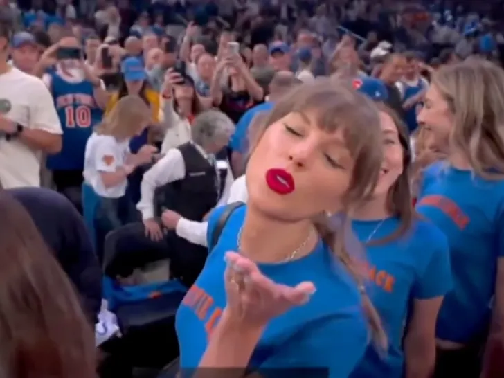 Taylor Swift blows a kiss, courtesy of the NBA.