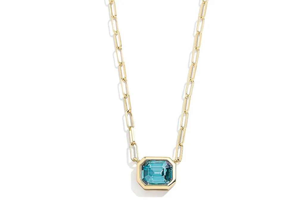 What to Purchase and Keep away from Procuring on Prime Day, In response to Skilled Customers 7 Golden chain with a blue rectangular jewel in the center.