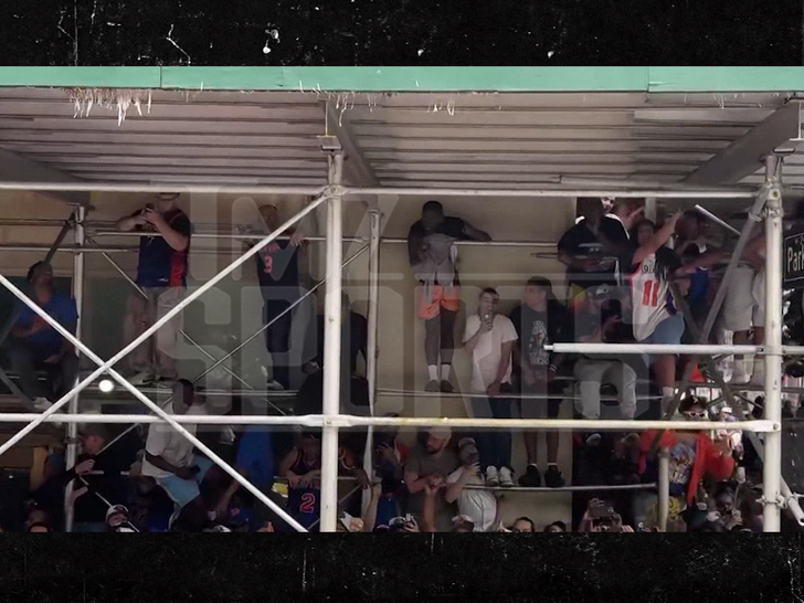 061826 fans climbing under 1