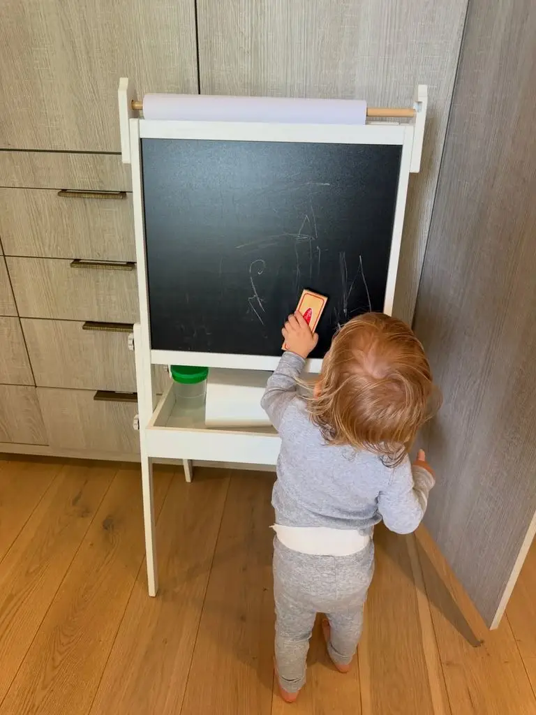 Katherine Schwarzenegger Shares First Indicators of Child Ford's Character With New Photographs 2 Photo shared by Katherine Schwarzenegger in May 2026 of her son Ford playing with an easel