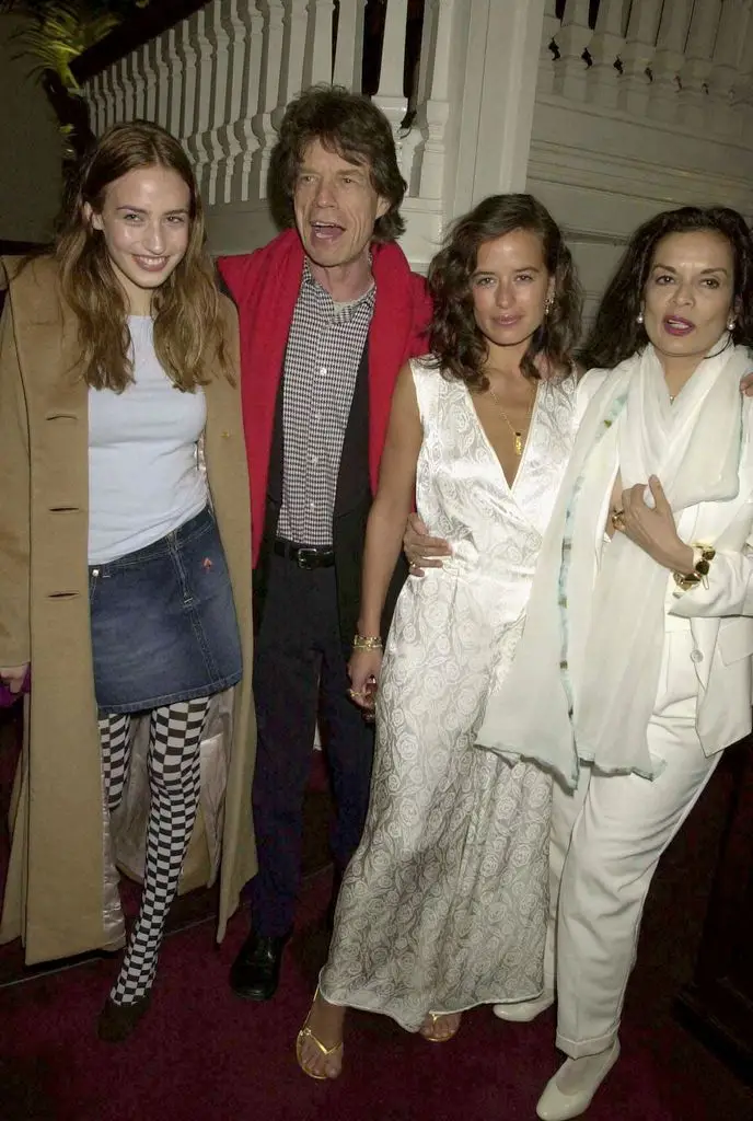 Mick Jagger's son has 'wild' response to rocker's Italian trip images 2 Mick Jagger standing with his daughters Elizabeth and Jade
