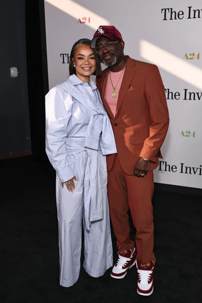 Dannella Howery and Lil Rel Howery attend the Los Angeles premiere of the film A24. "The invitation" at the DGA Theater on June 24, 2026 in Los Angeles, California. 