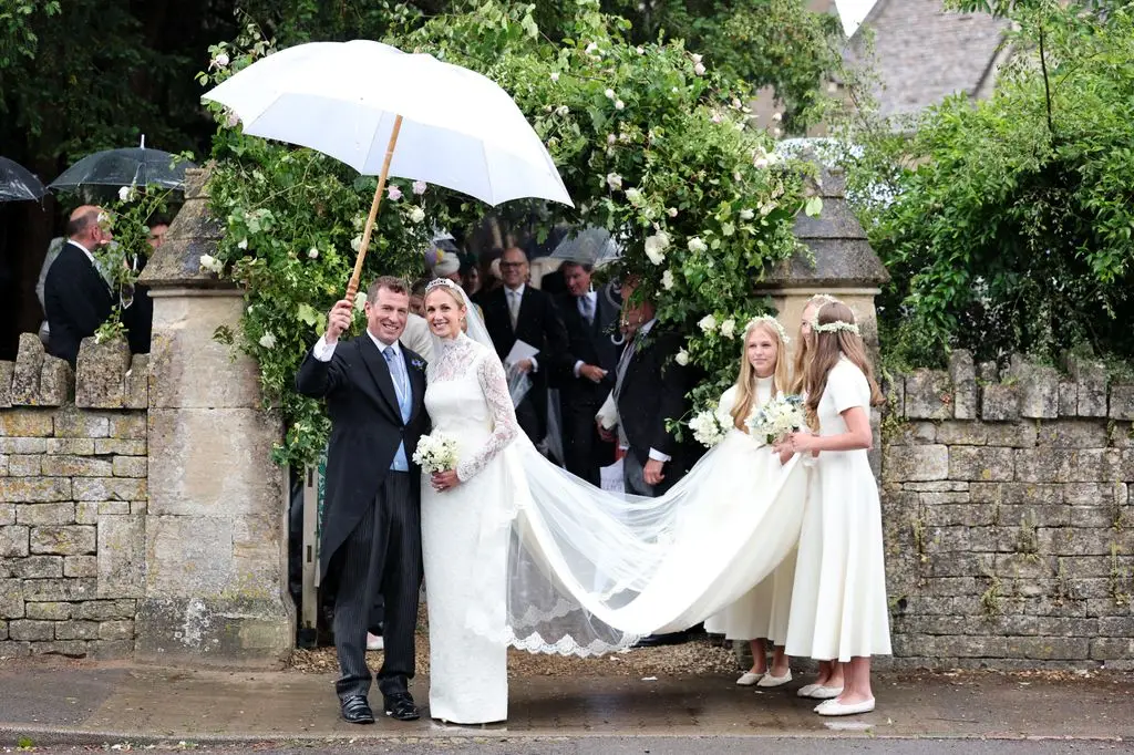 Peter Phillips and Harriet Sperling share their first romantic kiss after a fairytale marriage ceremony 3 Peter Phillips and Harriet Sperling leave their royal wedding alongside bridesmaids Georgina Sperling, Savannah Phillips and Isla Phillips at All Saints Church