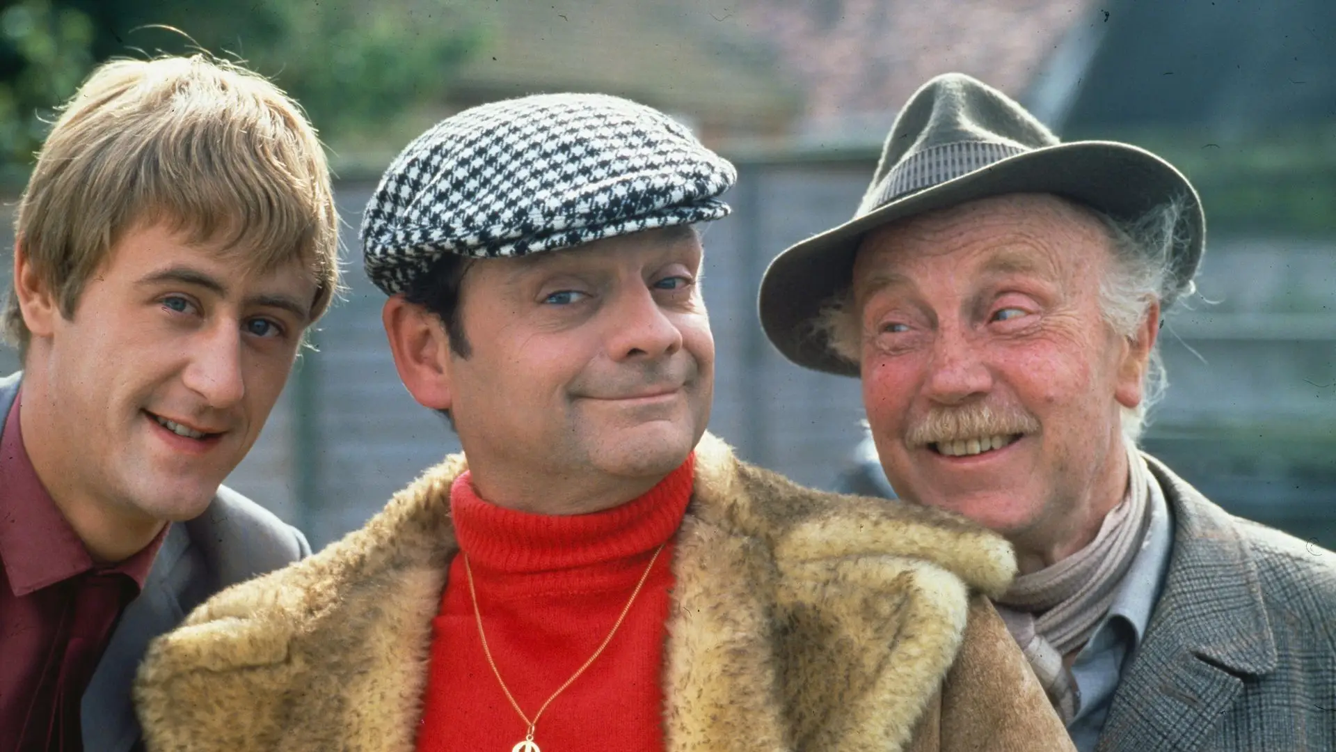 Nicholas Lyndhurst, David Jason and Lennard Pearce smiling in vintage outfits.