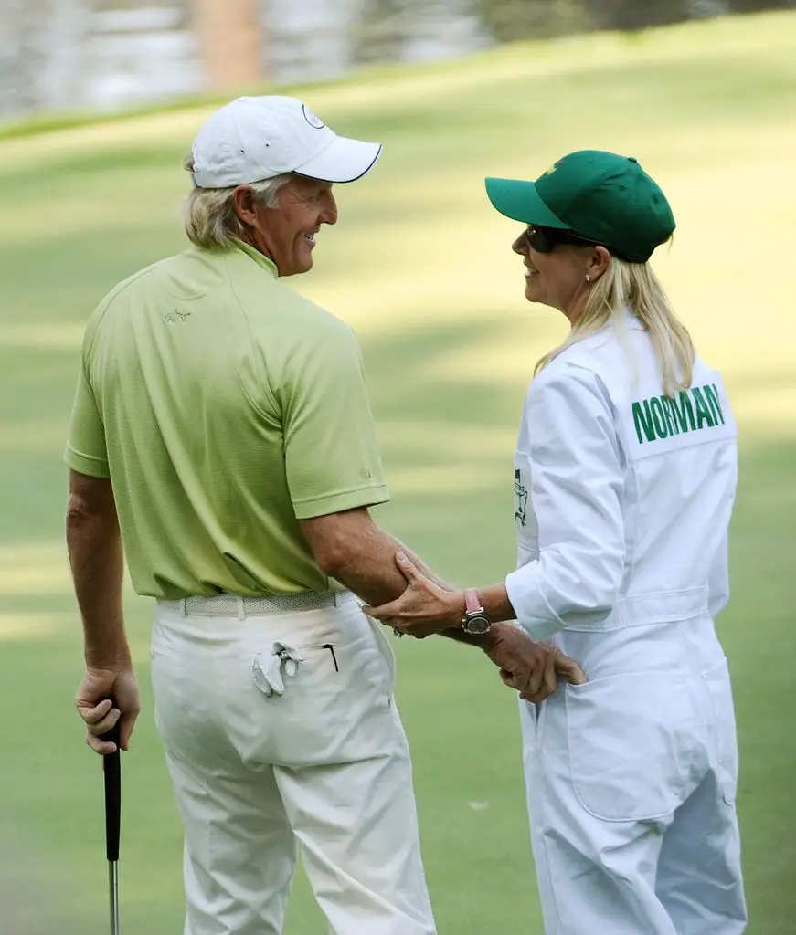 Chris with Greg Norman at the 2009 Masters tournament 