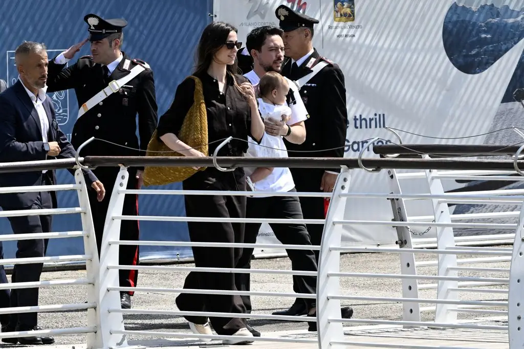 Princess Rajwa and Crown Prince Hussein Look Adored in New third Marriage ceremony Anniversary Photograph 2 Princess Rajwa (center), Crown Prince of Jordan, Hussein bin Abdullah and their daughter Iman Bint Hussein board a water taxi after landing at Venice Marco Polo Airport
