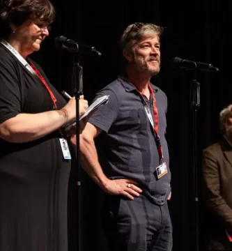 Barry Ward on 'All people Digs Invoice Evans,' Netflix Sequence 'Grown Ups' 2 Barry Ward (center) at Karlovy Vary 2026