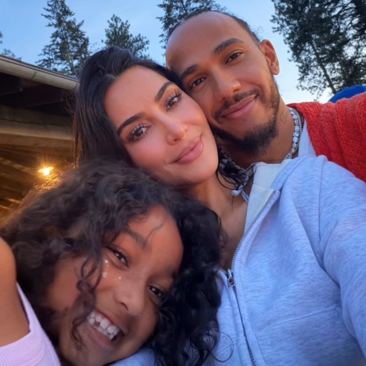 Lewis Hamilton poses with Kim Kardashian and her children in new photos from the lakes