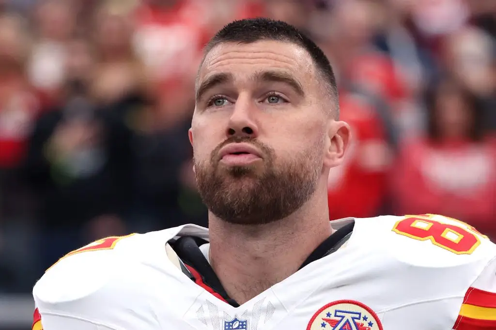 Travis Kelce #87 of the Kansas City Chiefs looks on during the national anthem before the game against the Las Vegas Raiders at Allegiant Stadium on January 4, 2026 in Las Vegas, Nevada