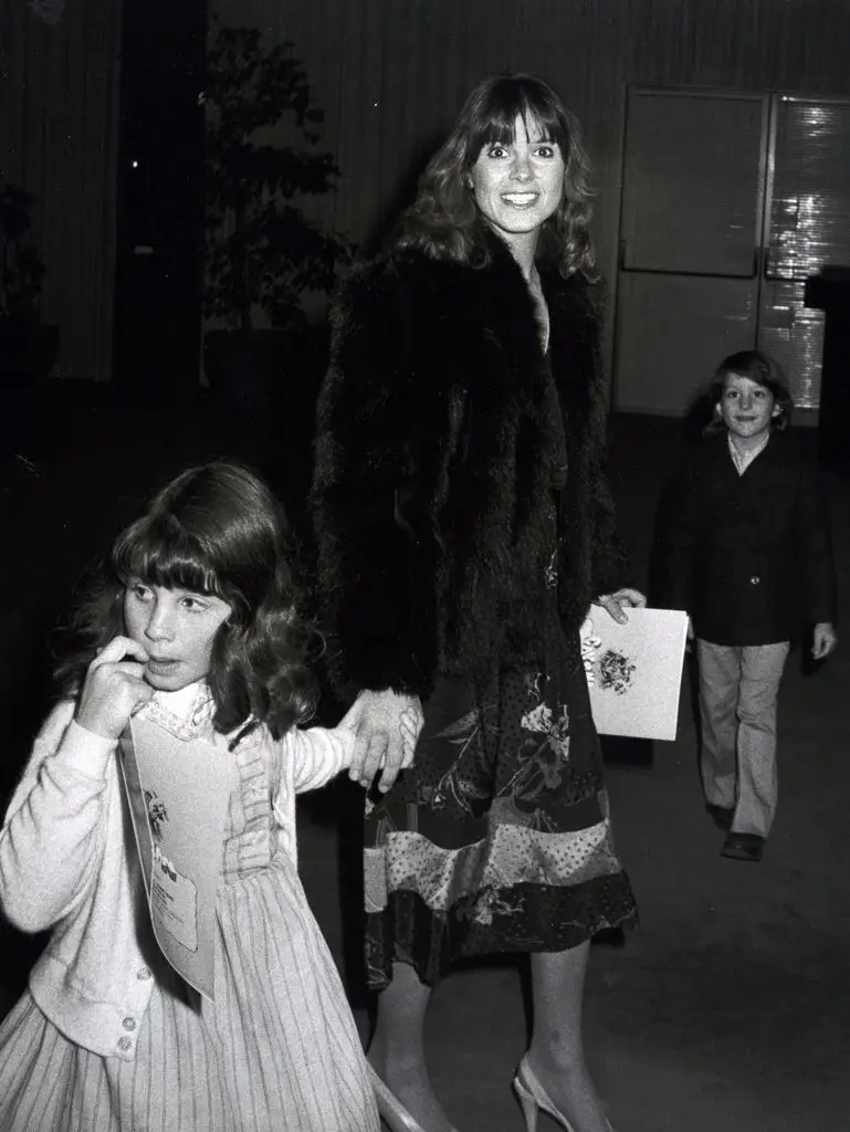 Actress Susan Saint James, her son Harmony Lucas and her daughter Sunshine Lucas attend the screening of Caveman on April 2, 1981 at the Academy Theater in Beverly Hills, California. 