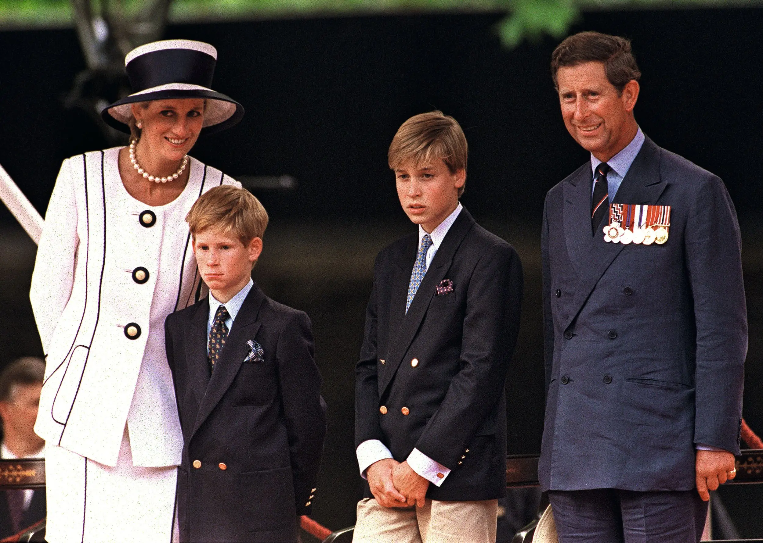 Meet Princess Diana's No 1 Fan Who Collects Diana's Outdated Stuff – and Would not Let Kate Middleton or Meghan Markle Borrow Them 5 Princess Diana, Prince Harry, Prince William and Prince Charles during a fashion show in London's shopping centre, during the VJ Day commemorations, August 1994. Diana wears a Tomasz Starzewski suit and a Philip Somerville hat. (Photo by Terry Fincher/Getty Images)