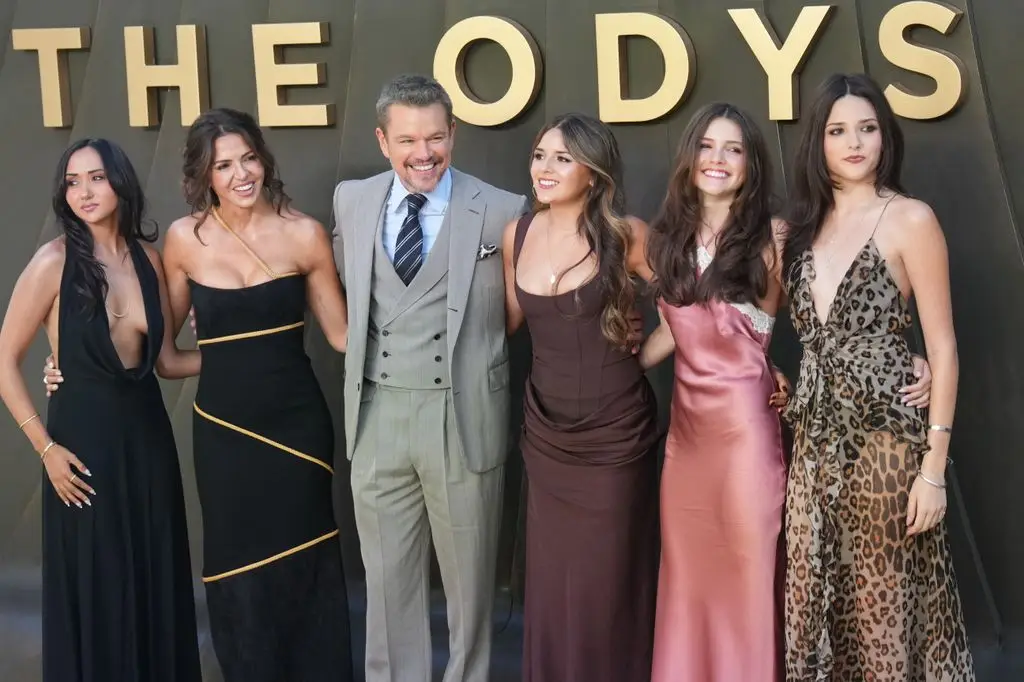 Matt Damon reveals strict 'non-negotiable' rule in his 20-year marriage to spouse Luciana 4 Matt Damon stands with his wife and daughters, all smiling, in front of a “THEODYS” set.