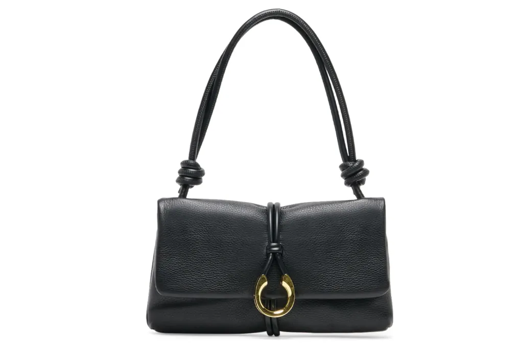 What Web page Six Editors Are Actually Shopping for at Nordstrom's Anniversary Sale 8 Black textured leather handbag with gold horseshoe clasp.