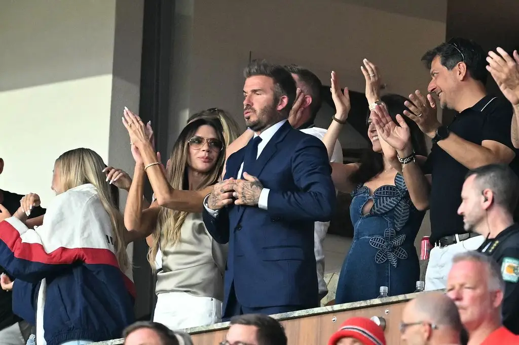 The Beckhams watched the match with concern